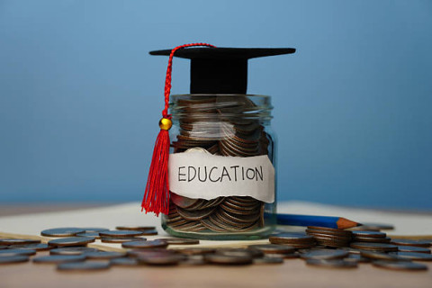cash jar with word education on it
