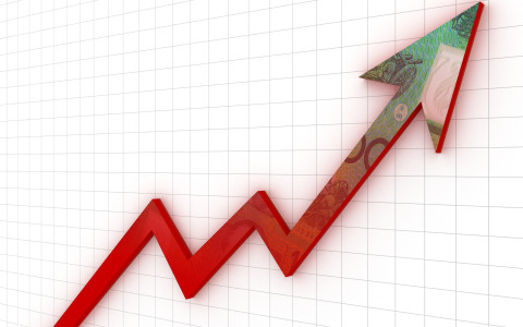 Arrow pointing up with money watermarked in the background