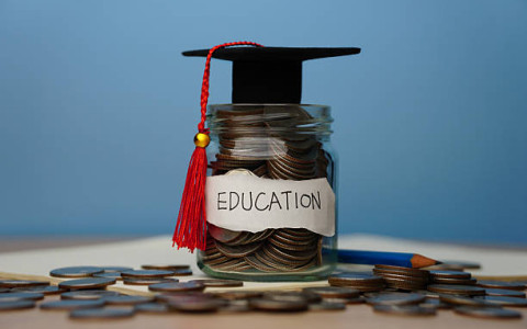 cash jar with word education on it
